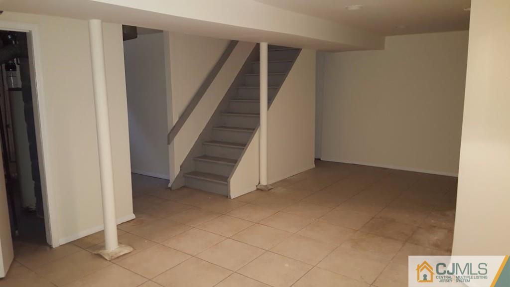 4 Wilcox Road New Brunswick, NJ 08901 - Photo 9 of 14 a view of entryway with stairs