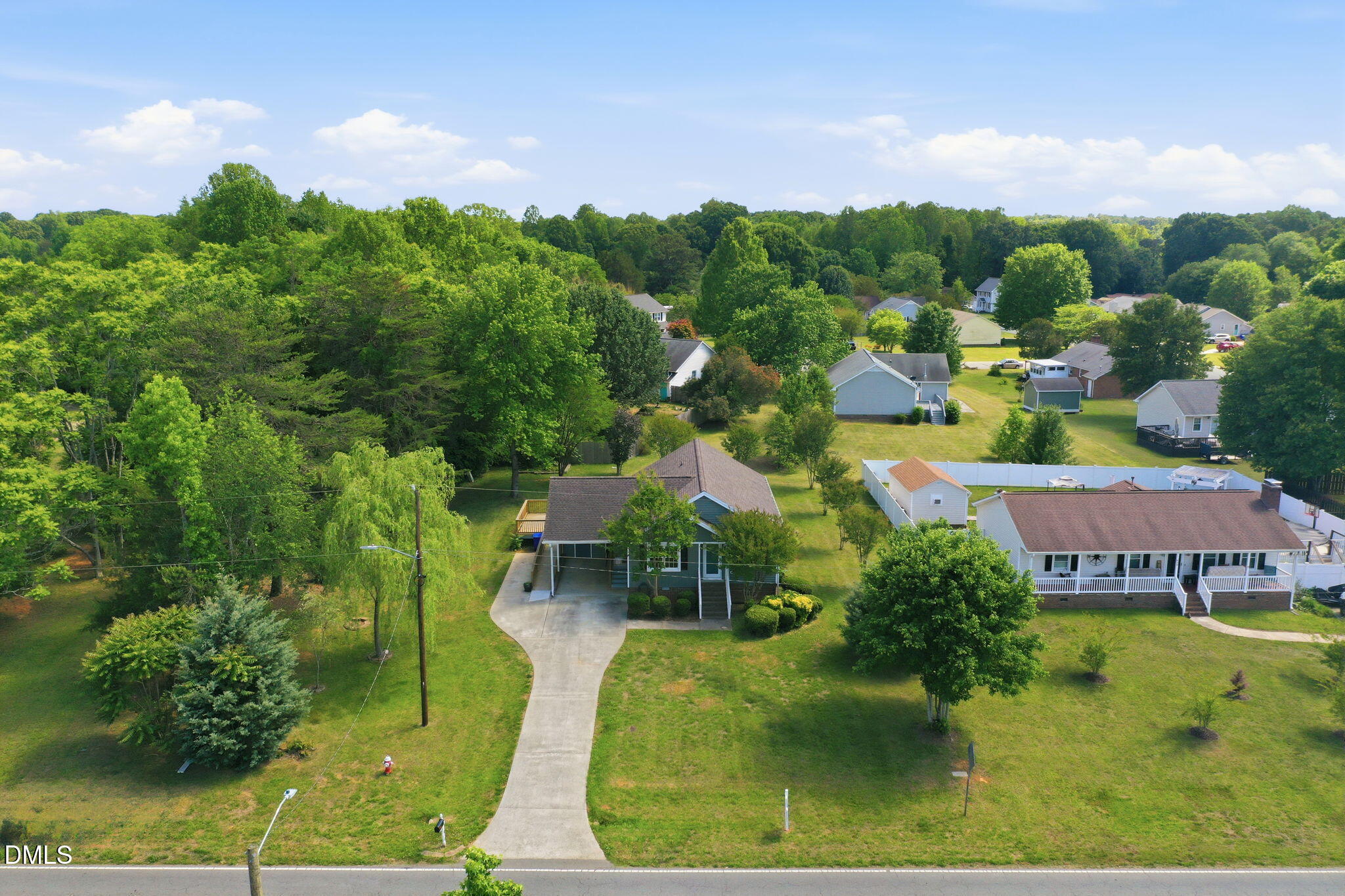 812 East Stagecoach Road Mebane, NC 27302 - Photo 3 of 25 an aerial view of residential houses with outdoor space and trees