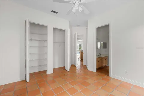 a bathroom with a double vanity sink and mirror