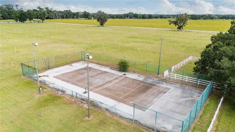 a view of a swimming pool and an outdoor space