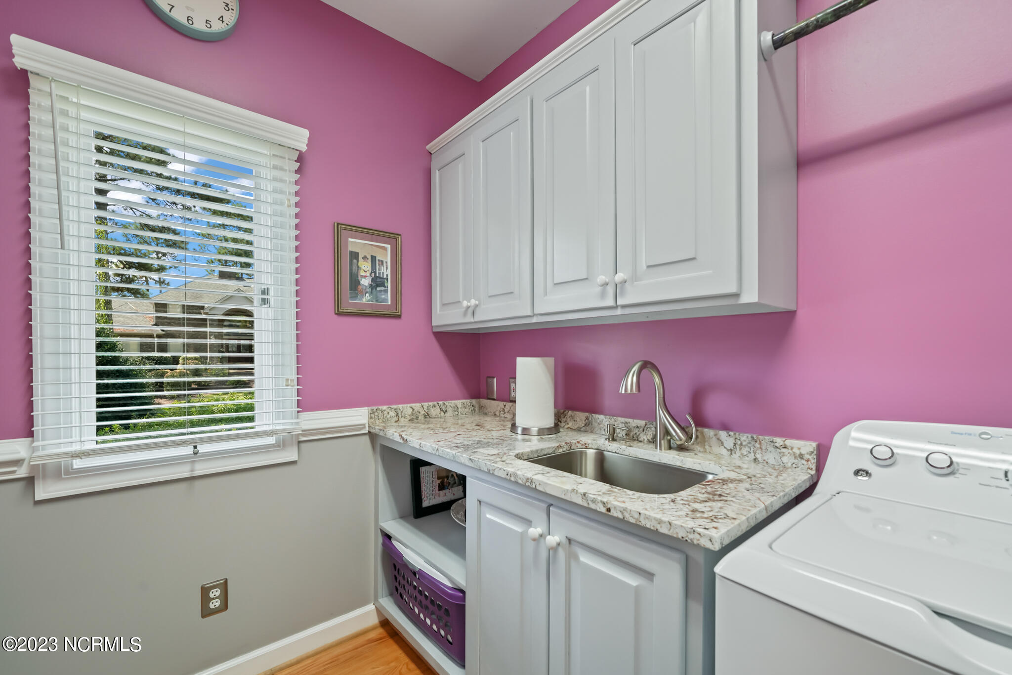 95 Hearthstone Road Pinehurst, NC 28374 - Photo 33 of 53 sink and cabinets in laundry