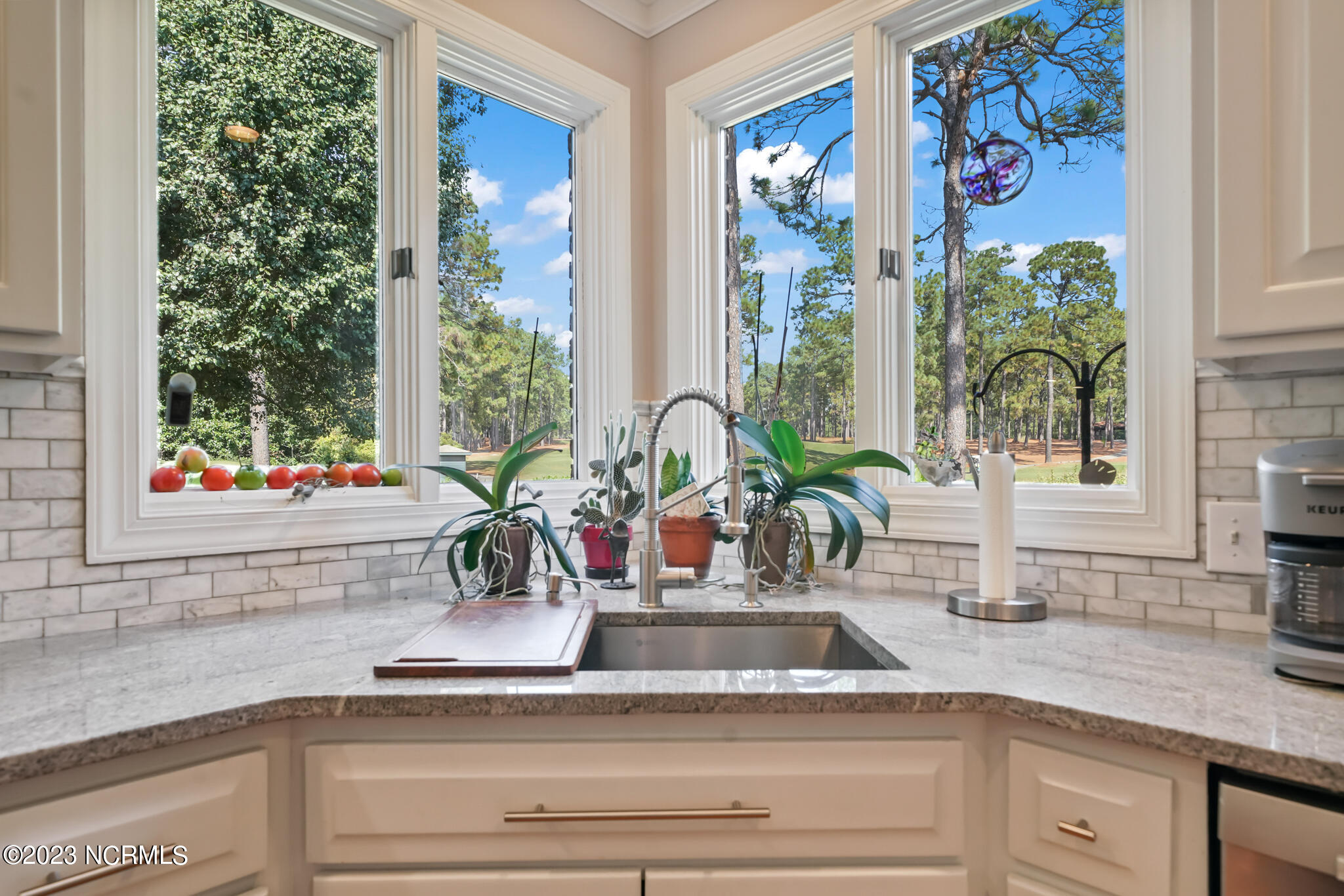95 Hearthstone Road Pinehurst, NC 28374 - Photo 10 of 53 kitchen sink overlooking golf