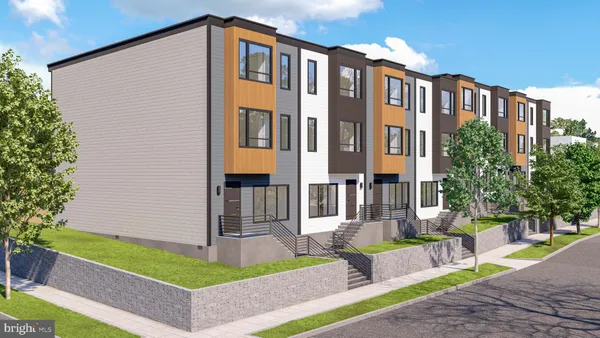 a front view of building with yard