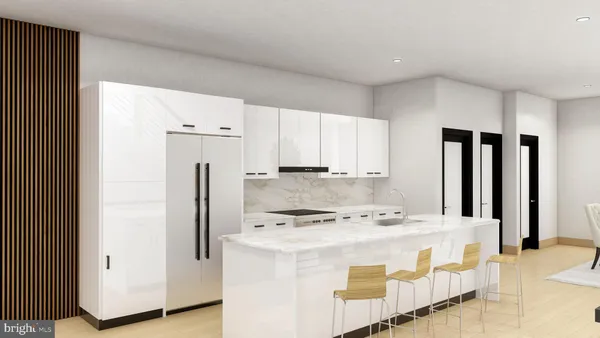 a kitchen with stainless steel appliances a refrigerator and a stove