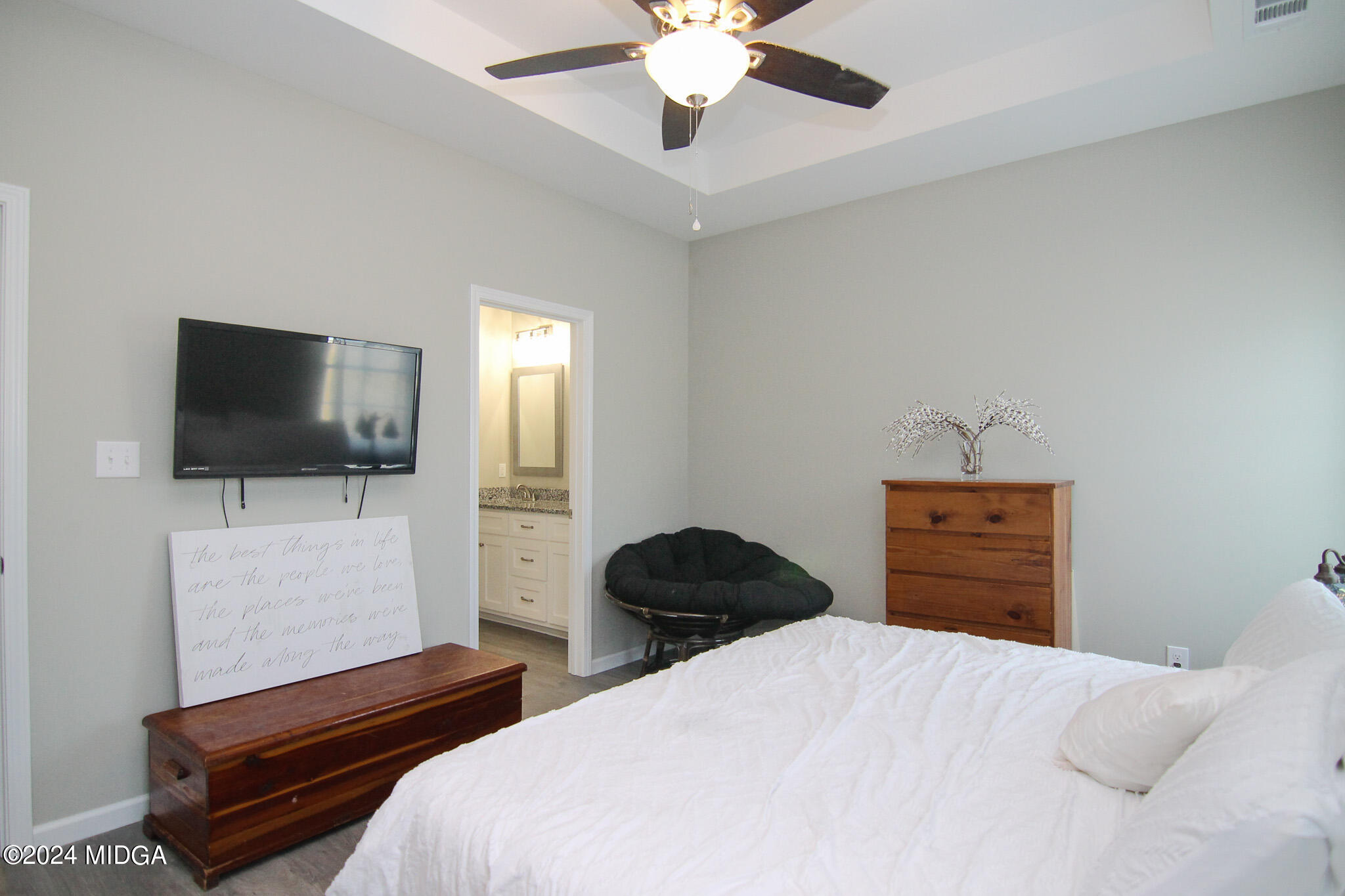 144 Summit Drive Byron, GA 31008 - Photo 15 of 27 a bedroom with a bed and a flat screen tv