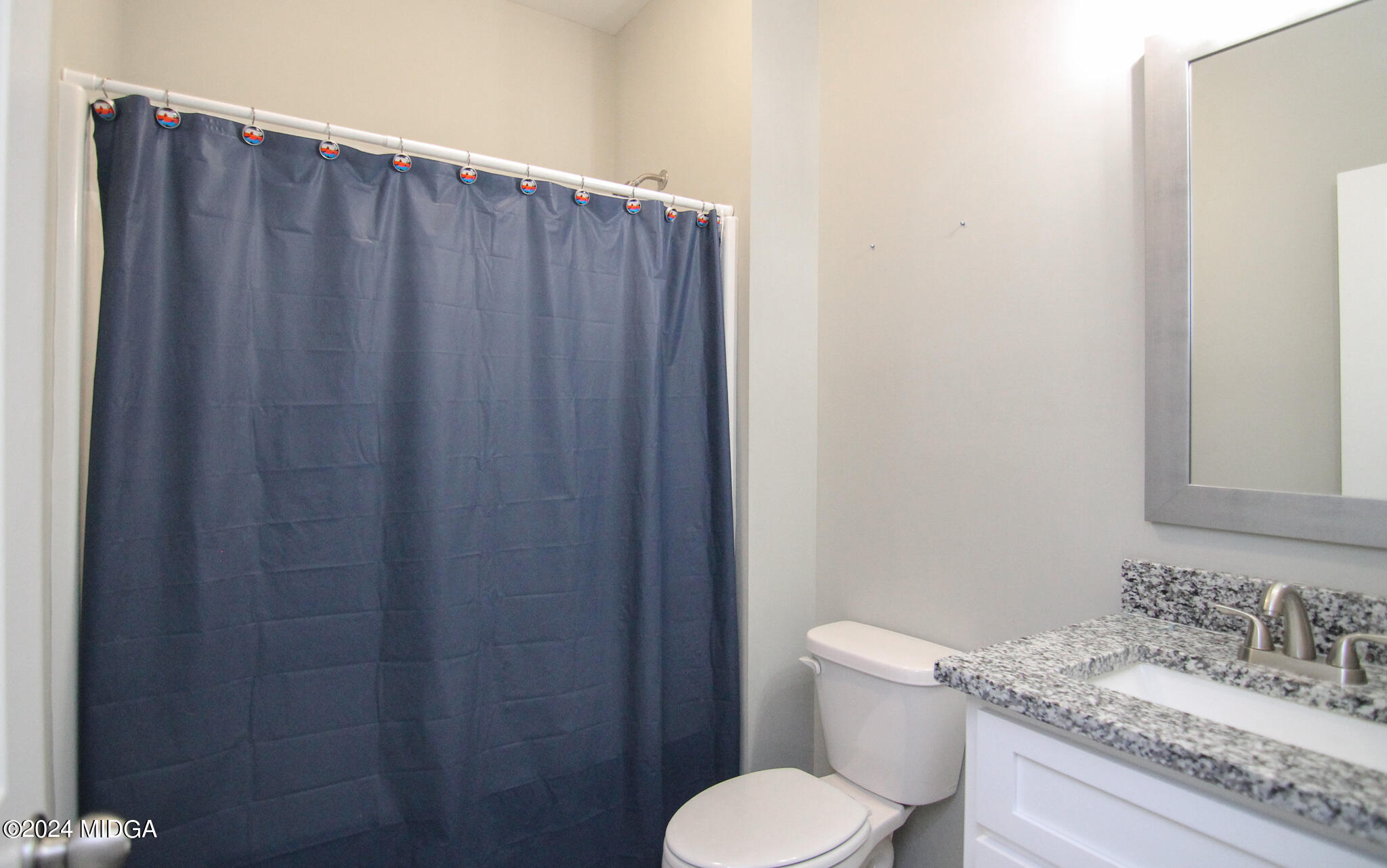 144 Summit Drive Byron, GA 31008 - Photo 20 of 27 a bathroom with a granite countertop sink toilet and a mirror