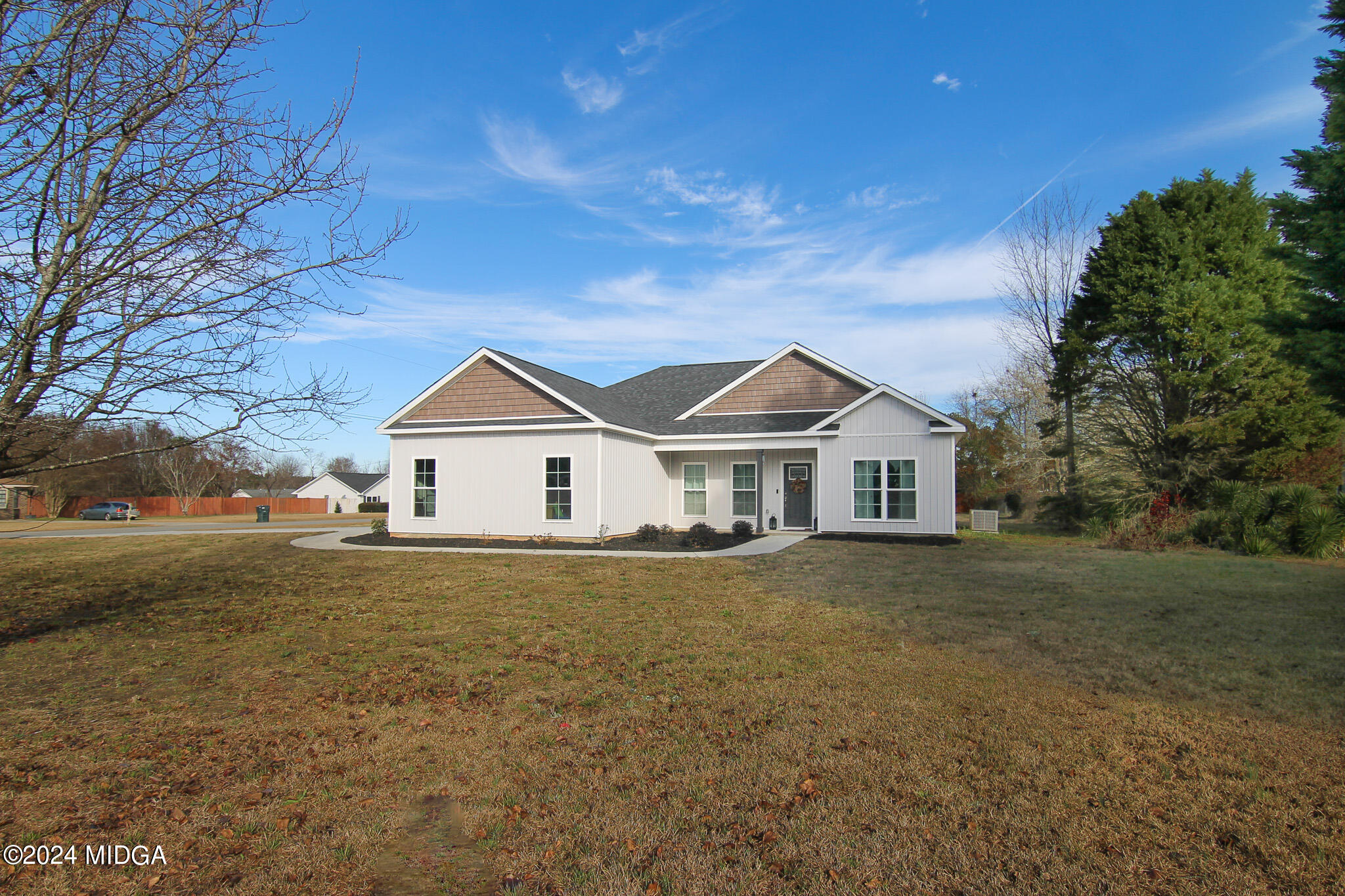 144 Summit Drive Byron, GA 31008 - Photo 2 of 27 a view of house with a yard