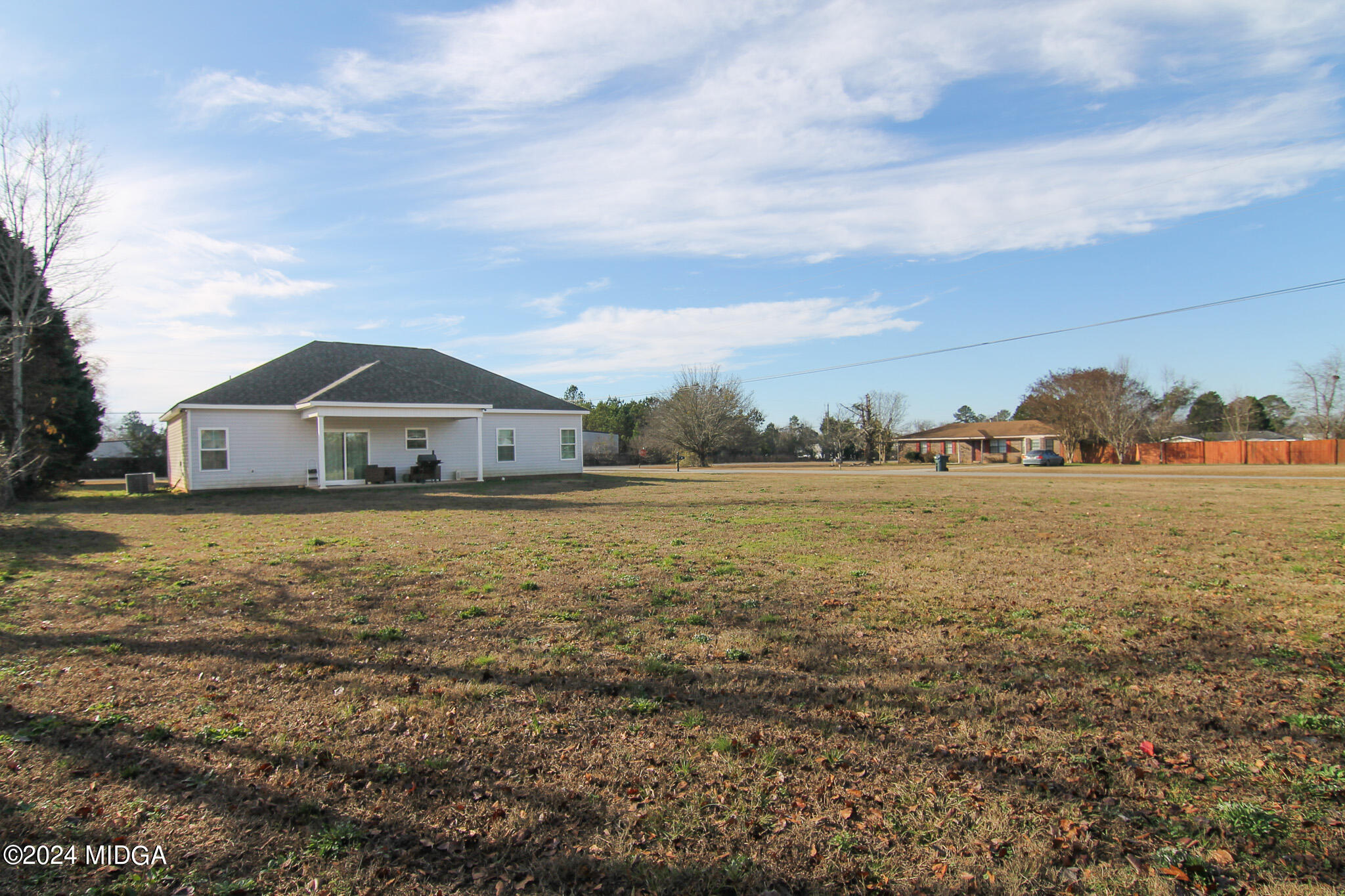 144 Summit Drive Byron, GA 31008 - Photo 26 of 27 a house view with a lake view