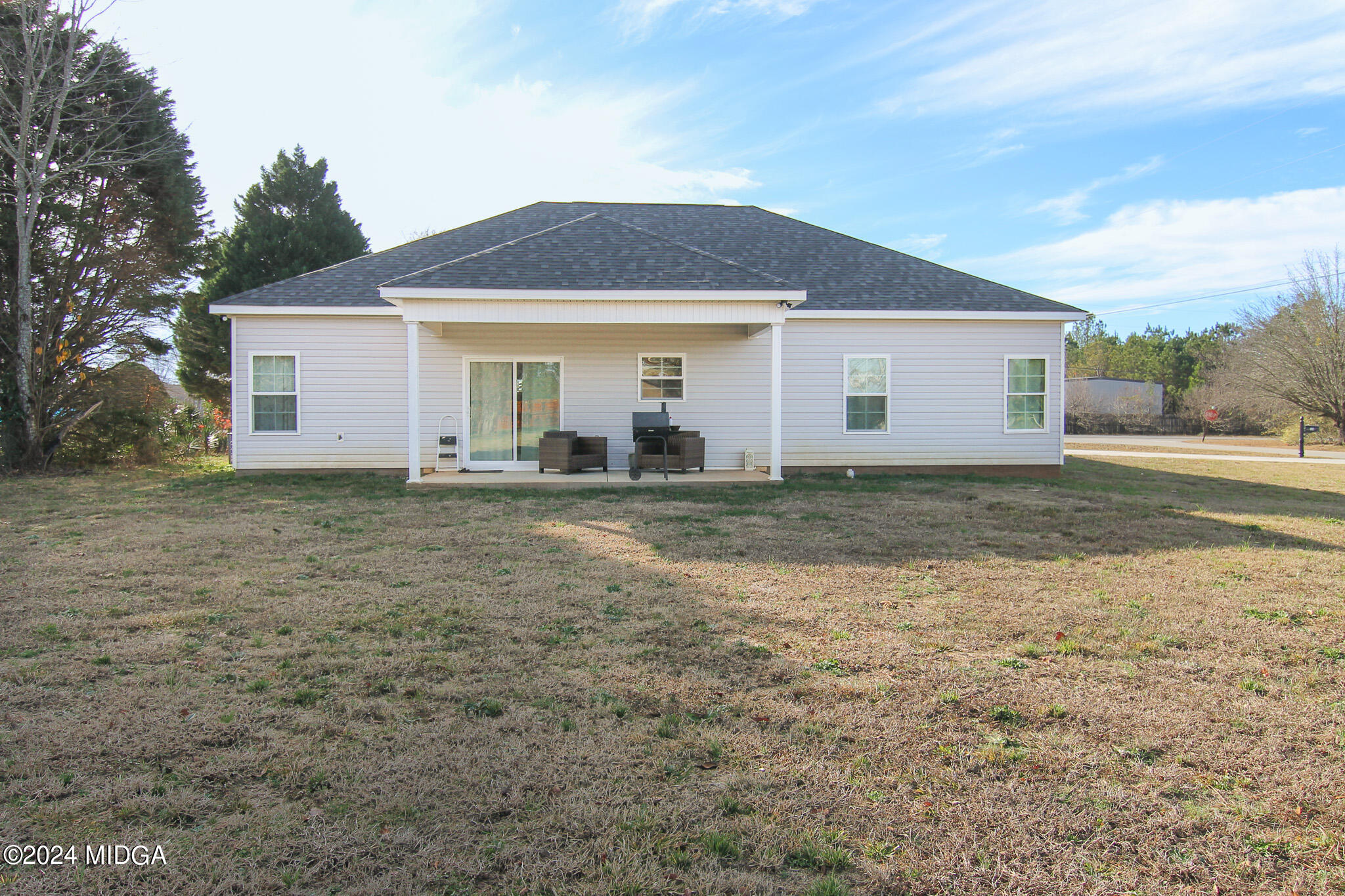 144 Summit Drive Byron, GA 31008 - Photo 27 of 27 a front view of a house with a yard
