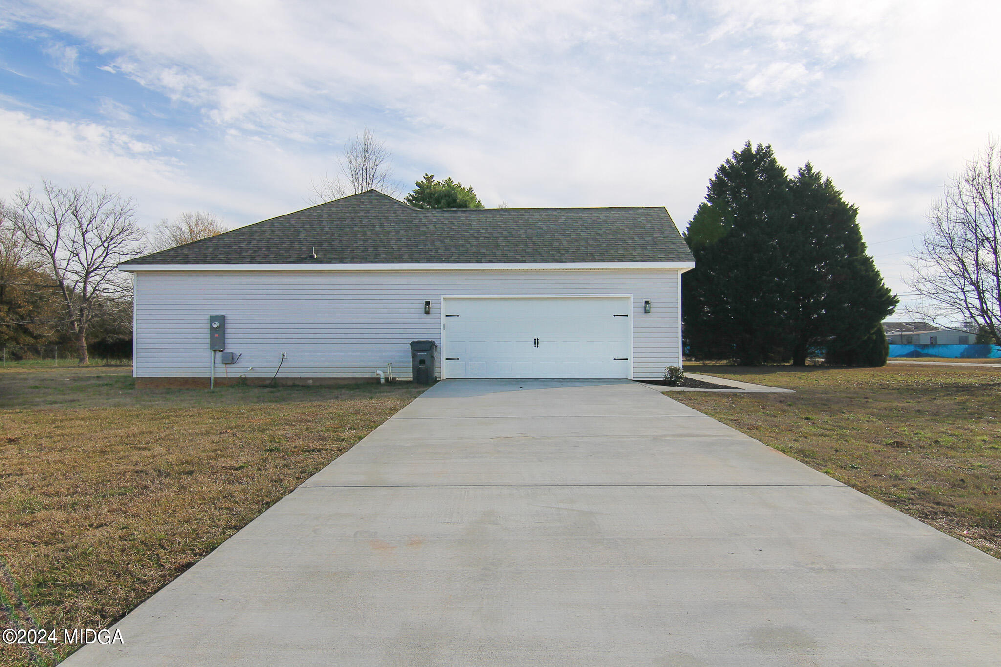 144 Summit Drive Byron, GA 31008 - Photo 4 of 27 a view of a house with a yard