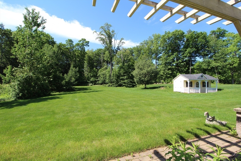 5 Gableview Lane Southwick, MA 01077 - Photo 13 of 41 a front view of a house with garden
