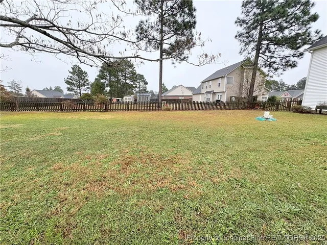 a view of an outdoor space and a yard