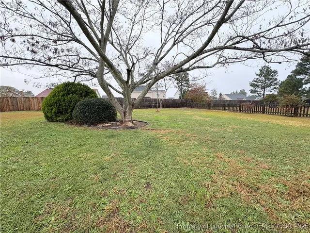 a view of a patio with a yard