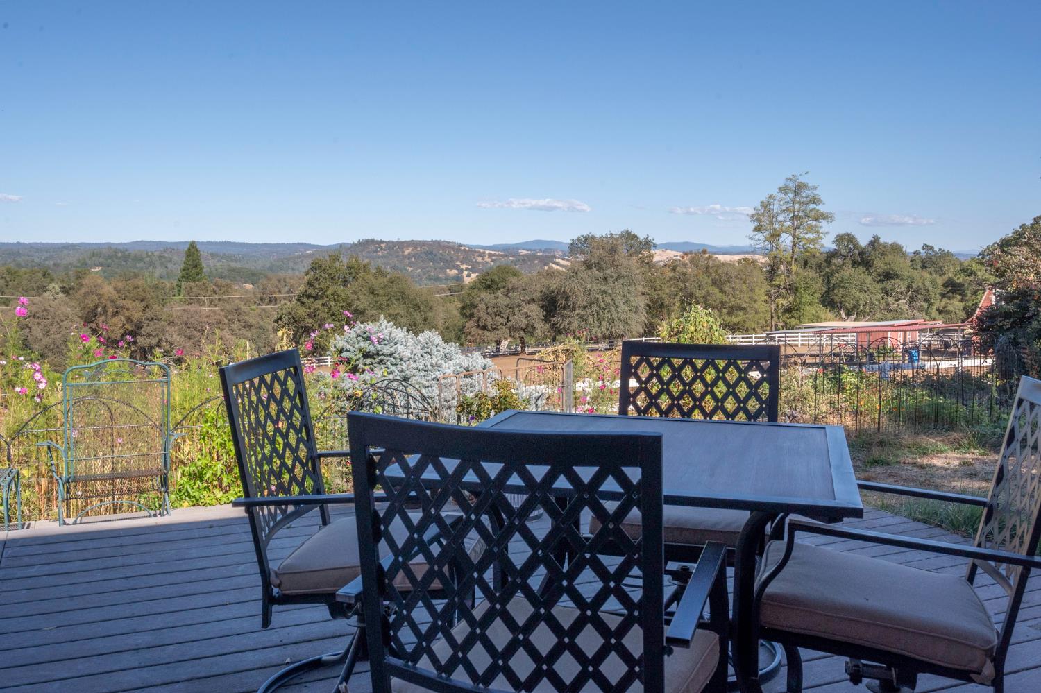 4770 Pedro Hill Road Pilot Hill, CA 95664 - Photo 32 of 87 a view of a chairs and table on the roof deck