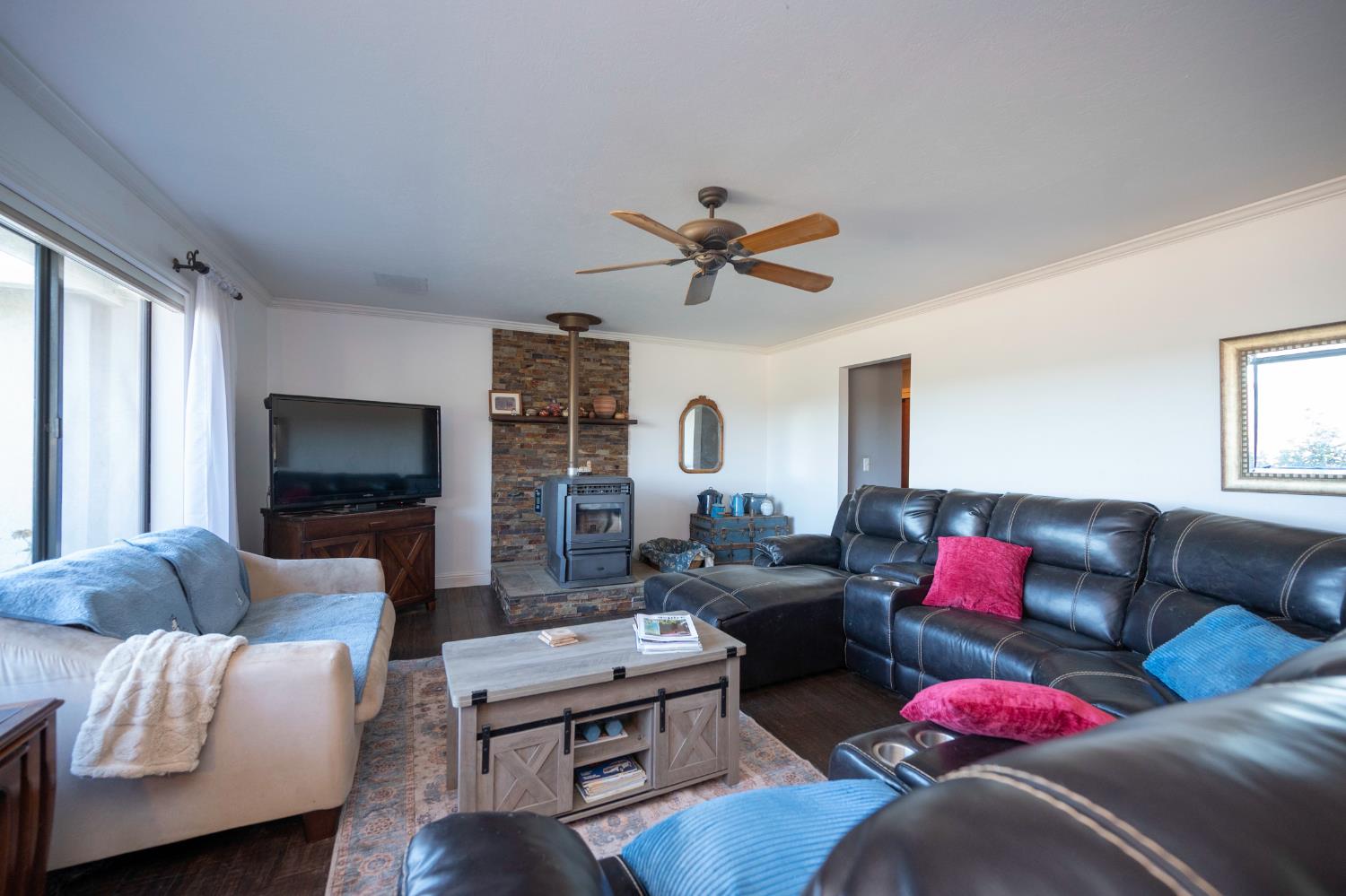 4770 Pedro Hill Road Pilot Hill, CA 95664 - Photo 35 of 87 a living room with furniture a flat screen tv and a window