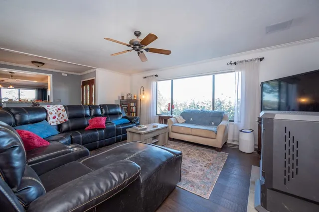 a bathroom with a granite countertop toilet a sink and bathtub