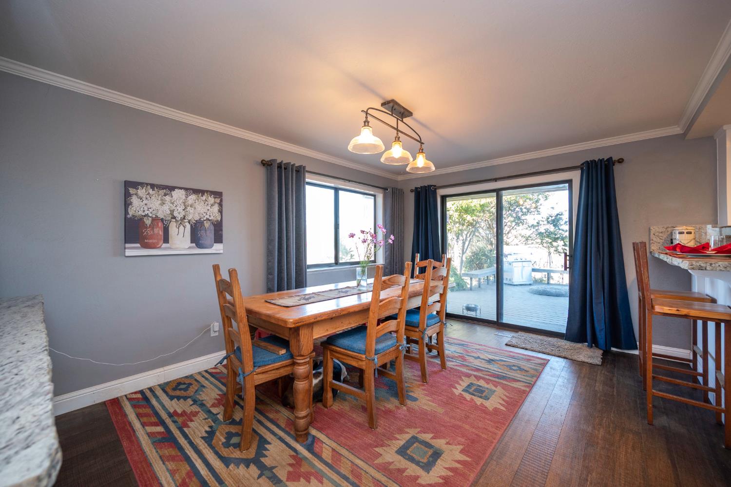 4770 Pedro Hill Road Pilot Hill, CA 95664 - Photo 44 of 87 a view of a dining room with furniture window and wooden floor