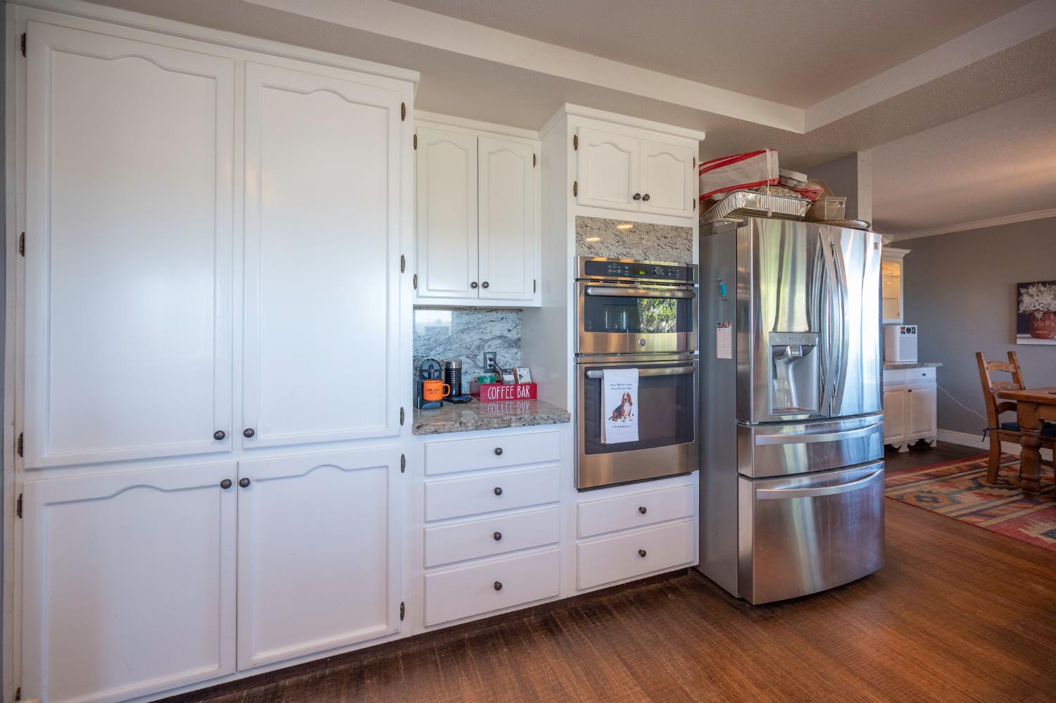 4770 Pedro Hill Road Pilot Hill, CA 95664 - Photo 49 of 87 a kitchen with cabinets and stainless steel appliances