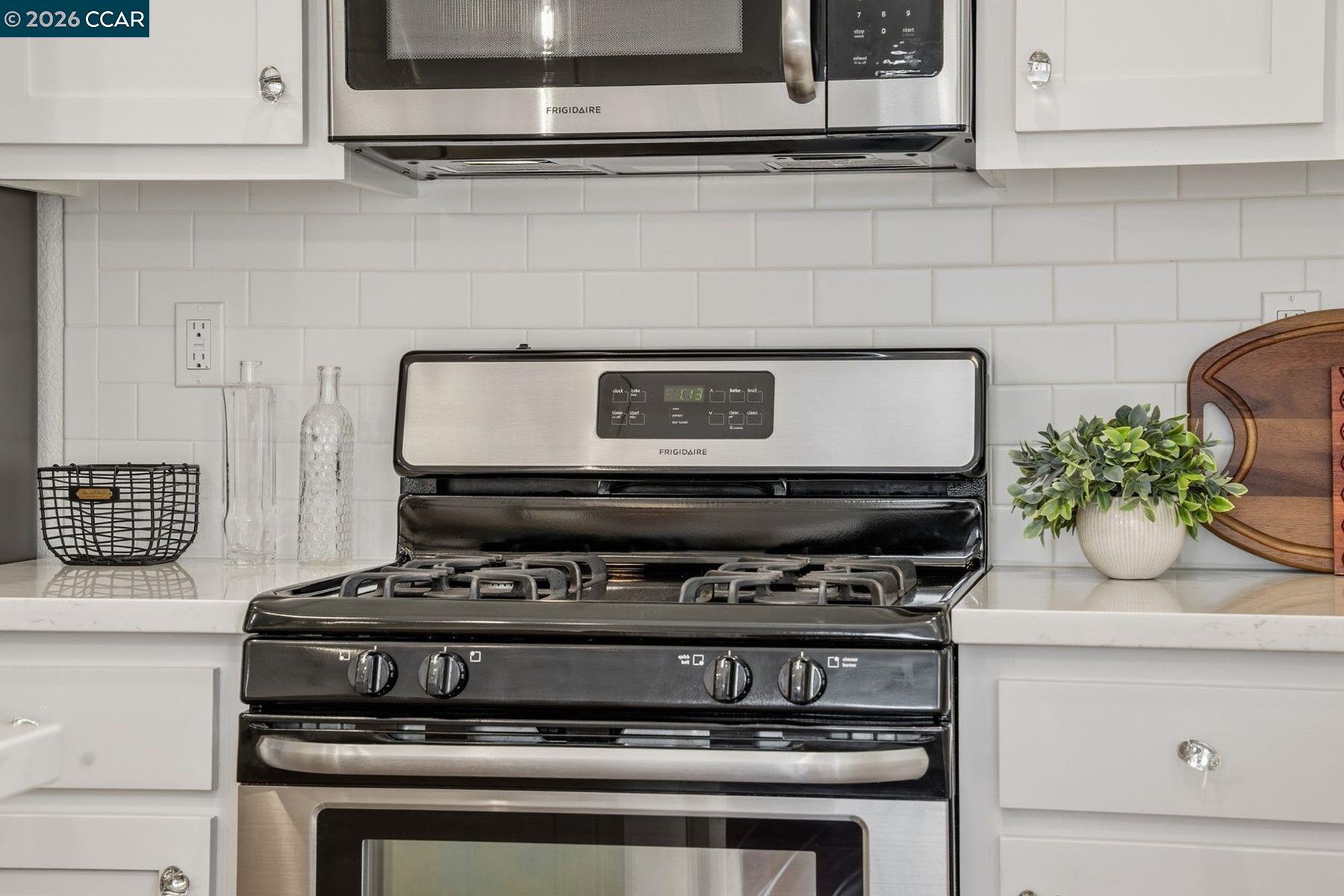 22640 Filbert Street Hayward, CA 94541 - Photo 20 of 60 a stove top oven sitting inside of a kitchen