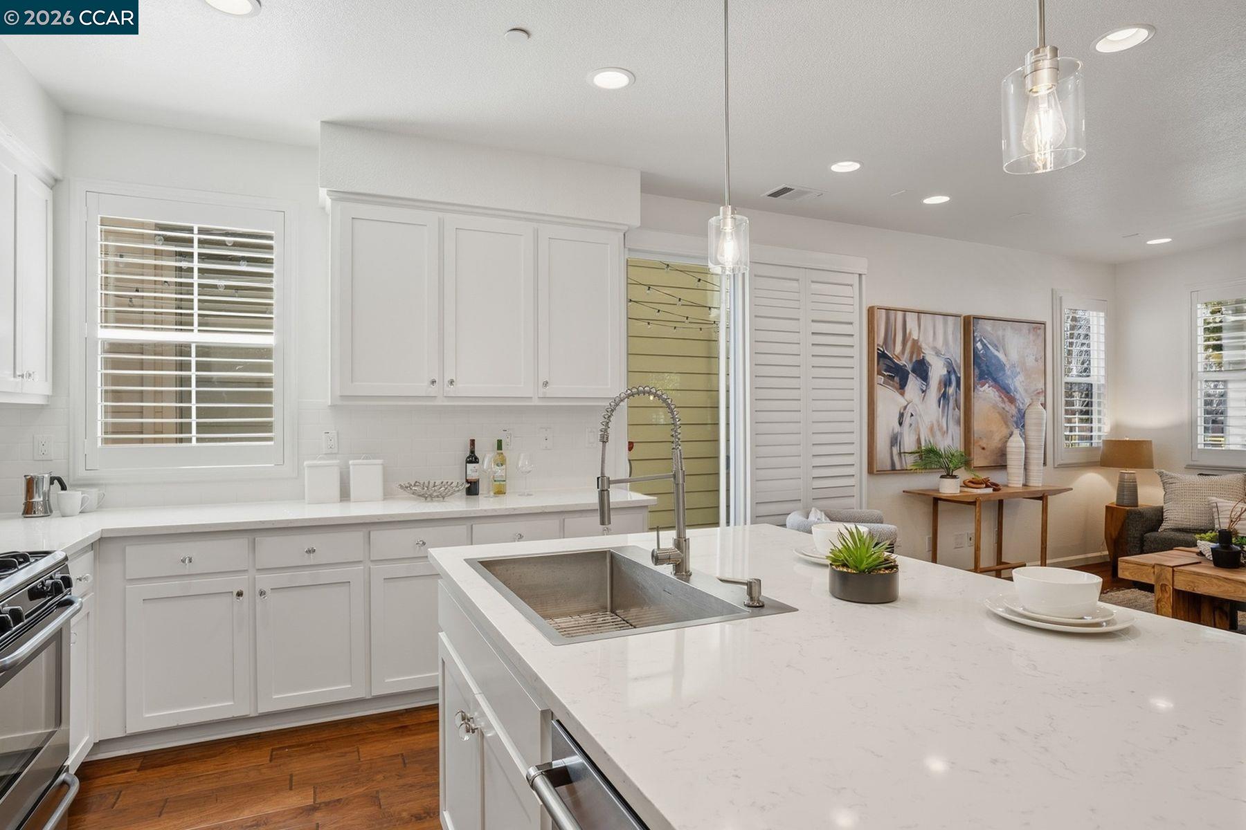 22640 Filbert Street Hayward, CA 94541 - Photo 21 of 60 a kitchen with a sink cabinets and window