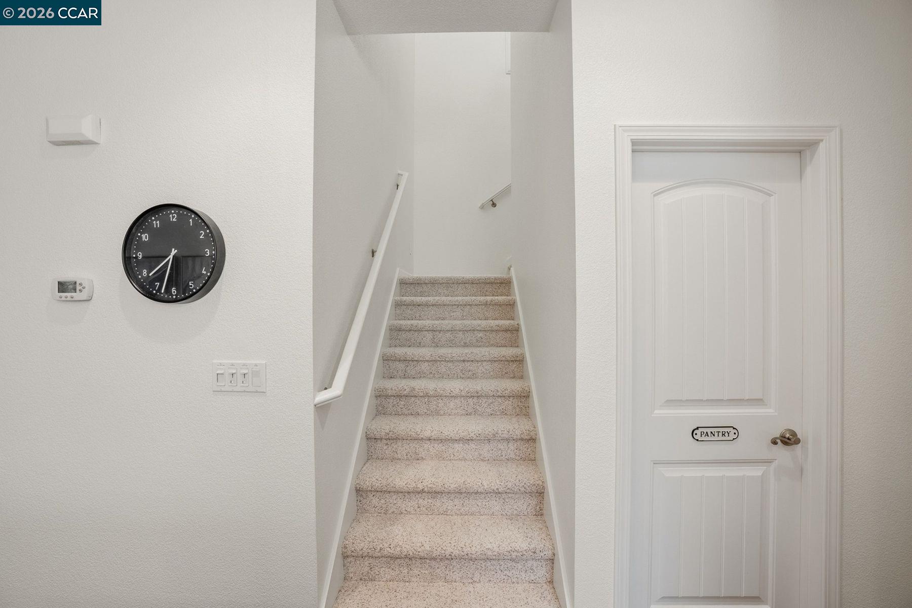 22640 Filbert Street Hayward, CA 94541 - Photo 26 of 60 a view of a hallway with wooden floor