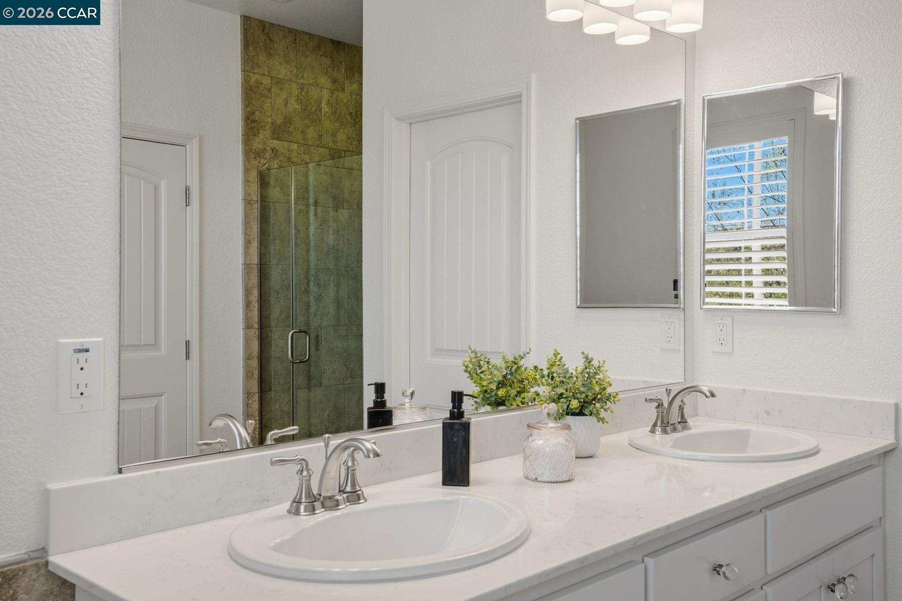22640 Filbert Street Hayward, CA 94541 - Photo 43 of 60 a bathroom with a sink and a mirror