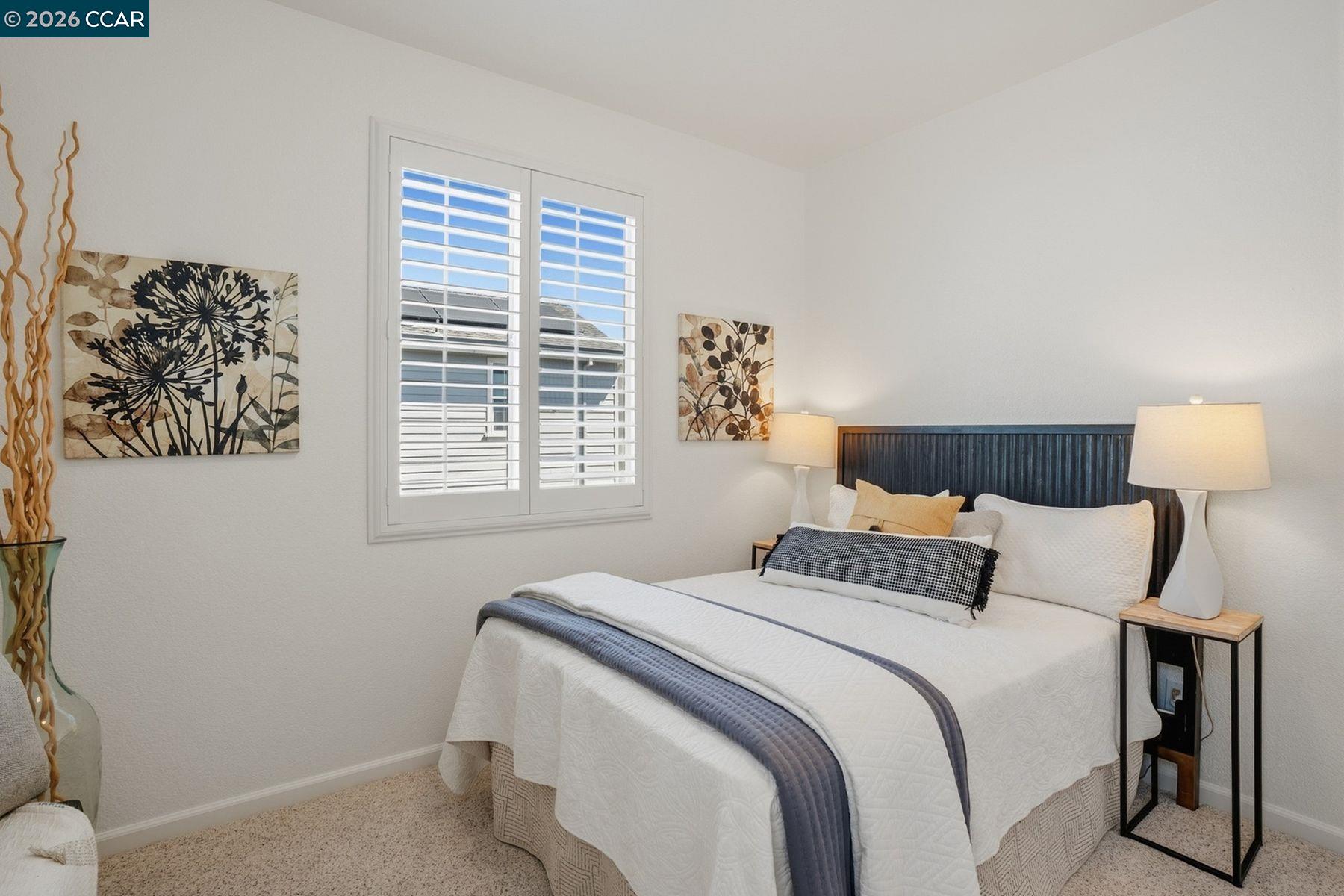 22640 Filbert Street Hayward, CA 94541 - Photo 47 of 60 a bedroom with a bed and a window