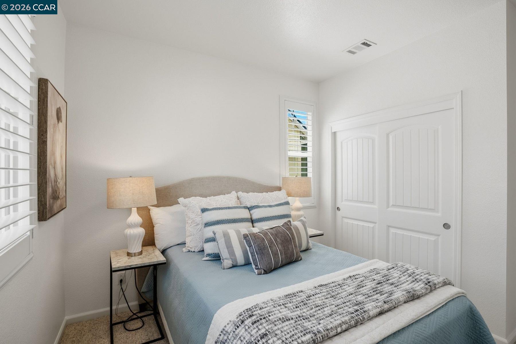 22640 Filbert Street Hayward, CA 94541 - Photo 51 of 60 a bedroom with a bed and a window