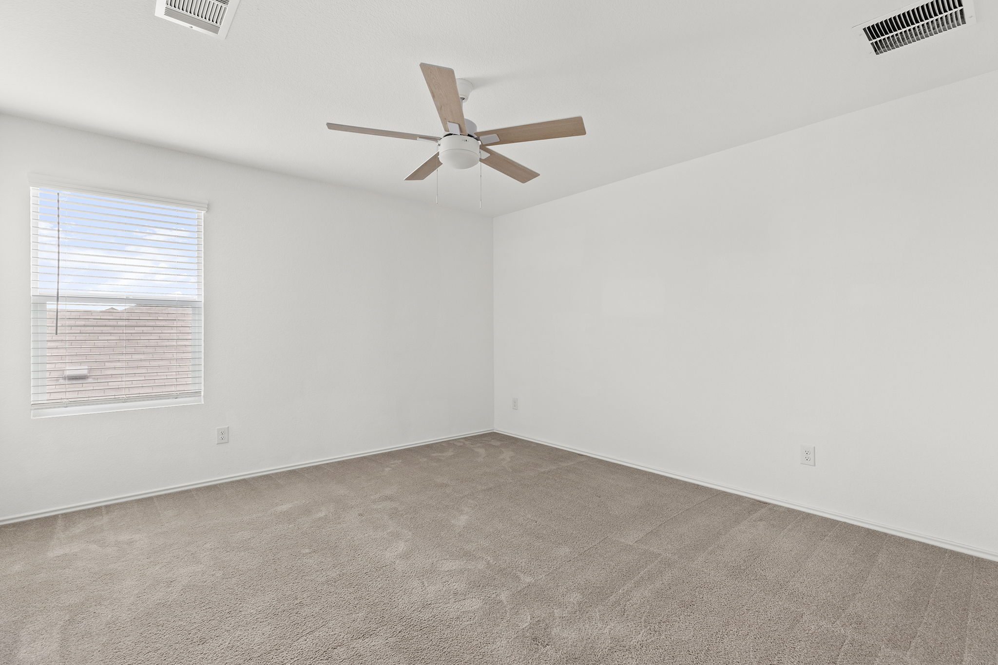 141 Texas Angel Way Jarrell, TX 76537 - Photo 20 of 33 an empty room with a window and a ceiling fan