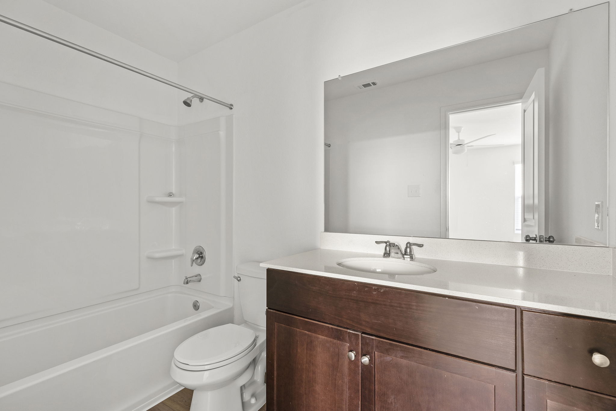141 Texas Angel Way Jarrell, TX 76537 - Photo 22 of 33 a bathroom with a sink a toilet and a bathtub