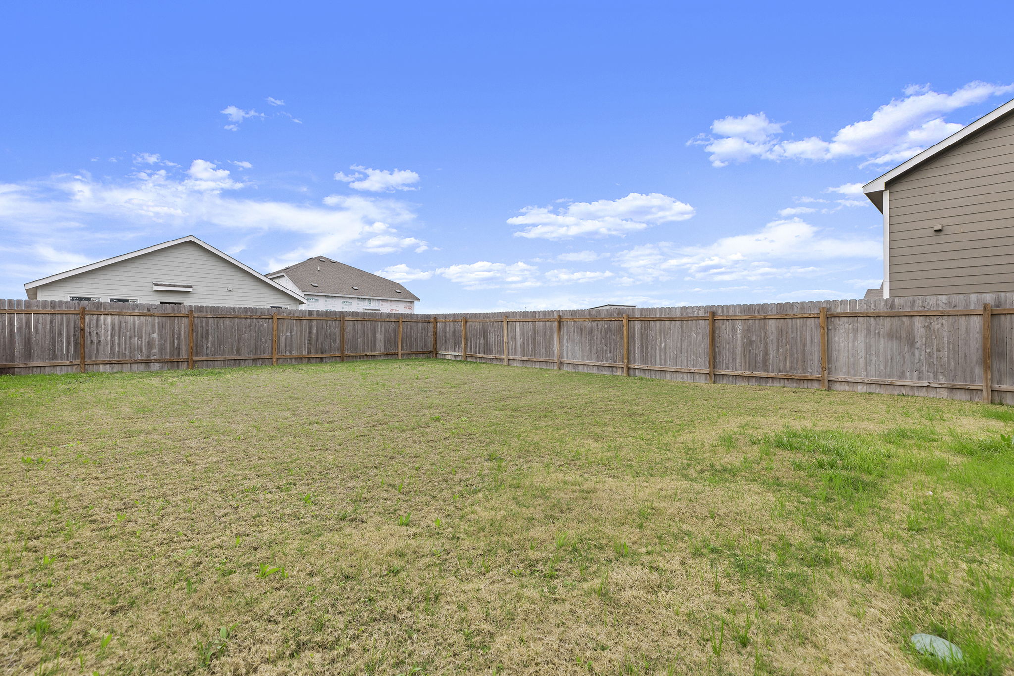 141 Texas Angel Way Jarrell, TX 76537 - Photo 31 of 33 a view of a house with a yard