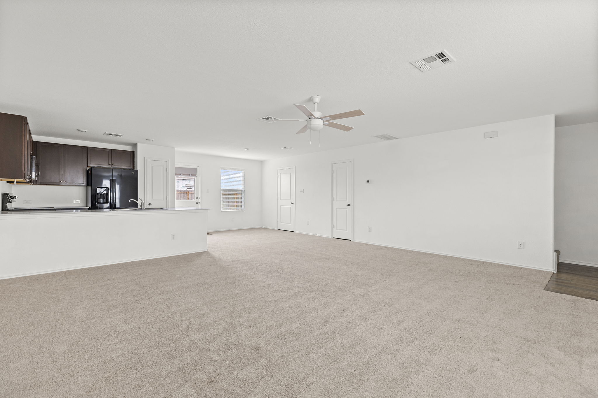 141 Texas Angel Way Jarrell, TX 76537 - Photo 6 of 33 a view of a kitchen with furniture and a kitchen