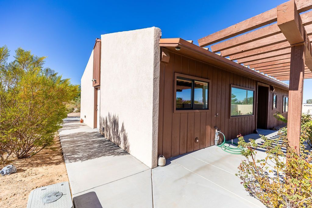 1325 Dunes Street Ridgecrest, CA 93555 - Photo 45 of 50 a view of a house with potted plants