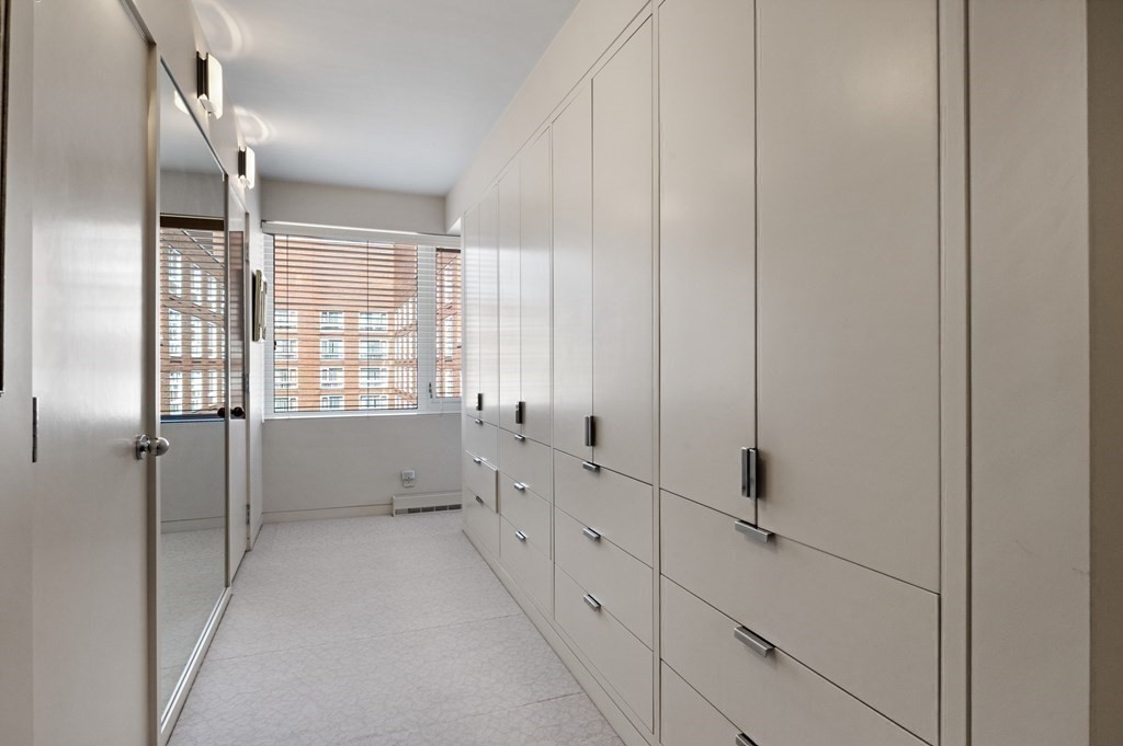 975 Memorial Drive, Unit 906 Cambridge, MA 02138 - Photo 18 of 37 a view of an empty room with a window