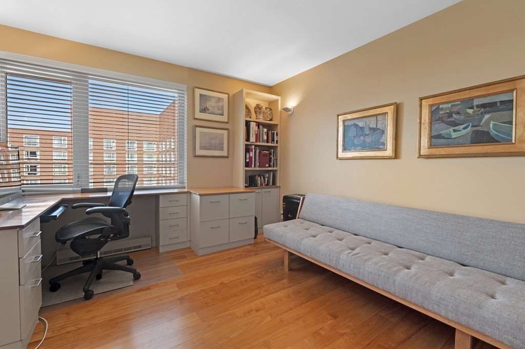 975 Memorial Drive, Unit 906 Cambridge, MA 02138 - Photo 23 of 37 a workspace with furniture and a window