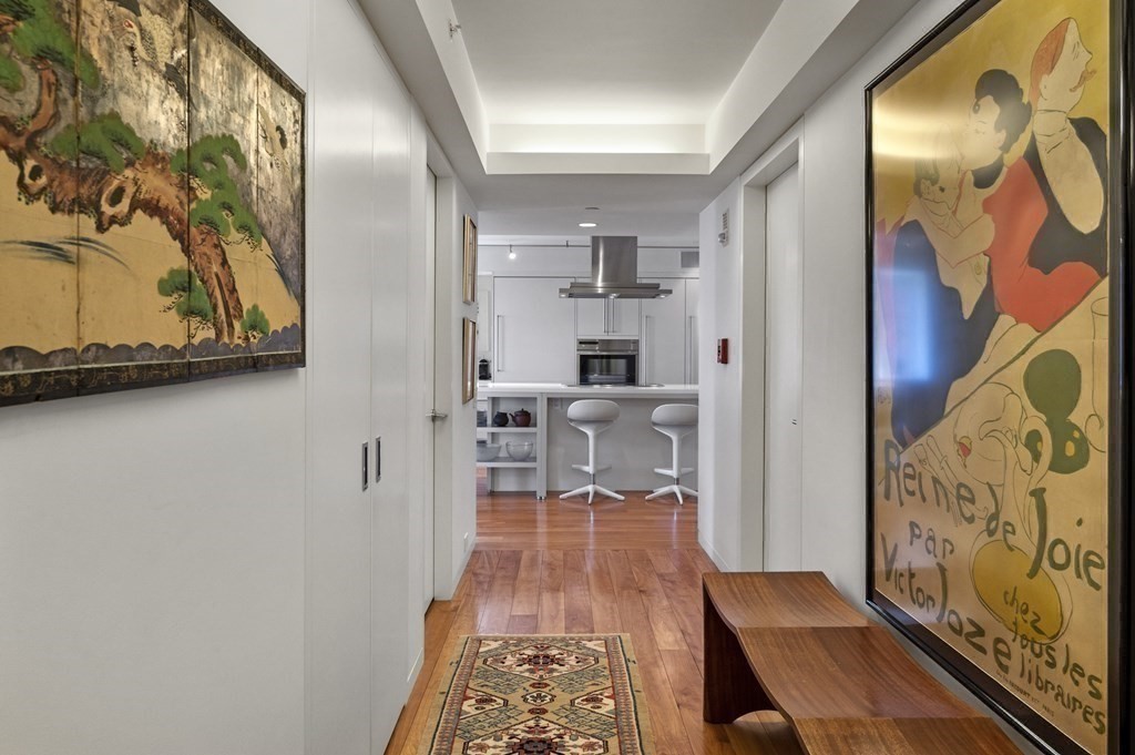 975 Memorial Drive, Unit 906 Cambridge, MA 02138 - Photo 26 of 37 a view of a living room with a rug