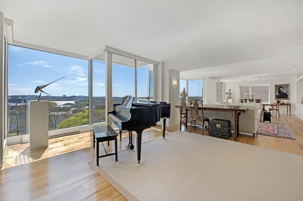 975 Memorial Drive, Unit 906 Cambridge, MA 02138 - Photo 3 of 37 a living room with furniture and a large window