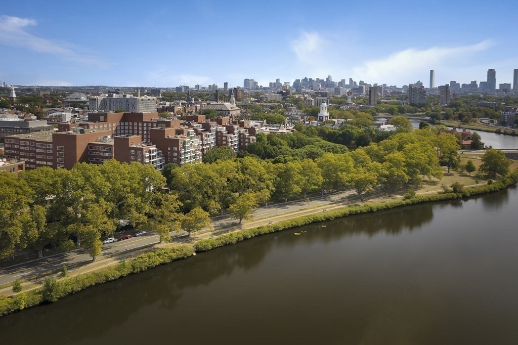 975 Memorial Drive, Unit 906 Cambridge, MA 02138 - Photo 35 of 37 an aerial view of residential building with outdoor space and lake view
