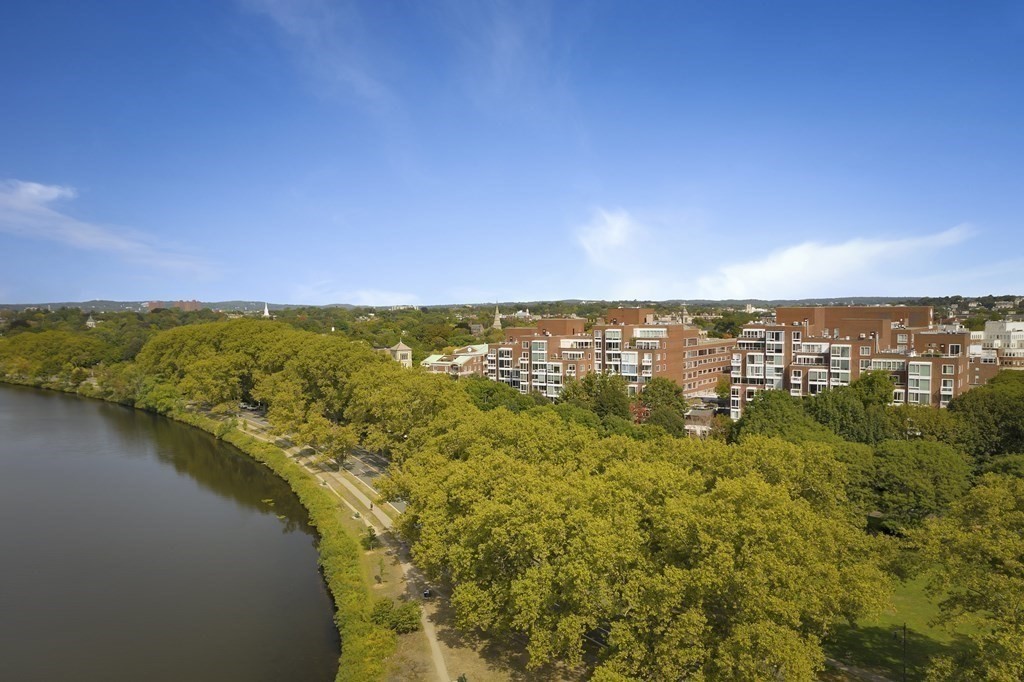 975 Memorial Drive, Unit 906 Cambridge, MA 02138 - Photo 36 of 37 a view of a lake with a city