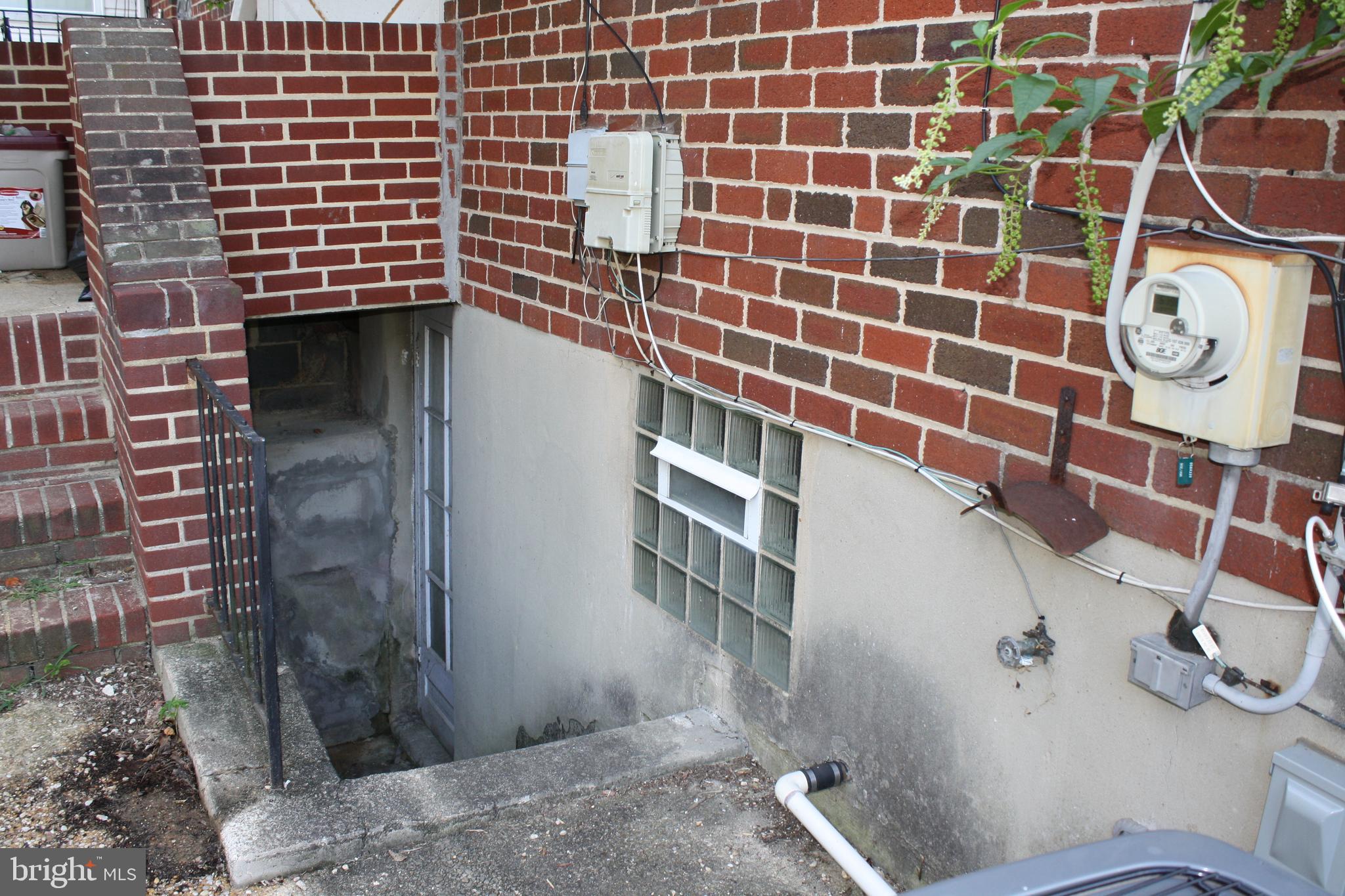 963 Masefield Road Baltimore, MD 21207 - Photo 22 of 24 Rear Basement entrance