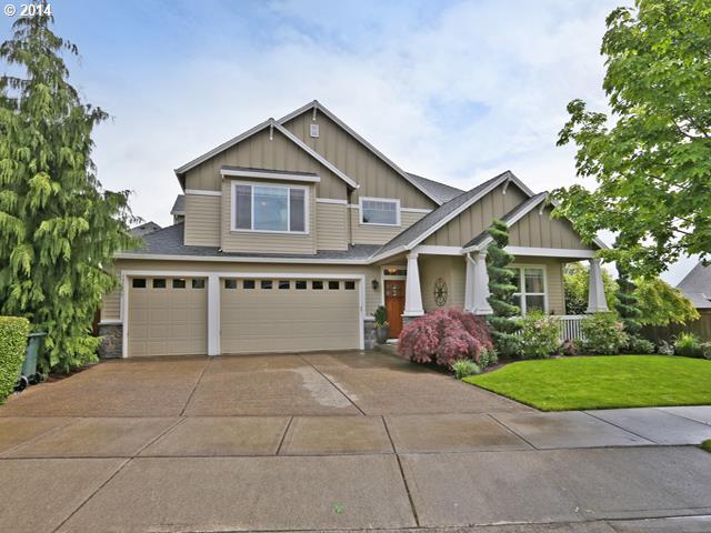 4920 Northwest 146th Place Portland, OR 97229 - Photo 1 of 16 a front view of house with yard and trees around