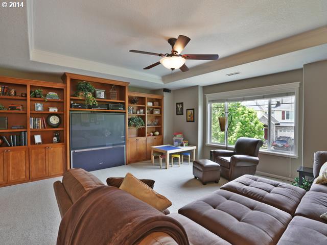4920 Northwest 146th Place Portland, OR 97229 - Photo 13 of 16 a living room with furniture and a large window