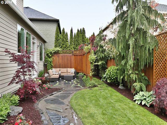 4920 Northwest 146th Place Portland, OR 97229 - Photo 16 of 16 a garden view with a seating space