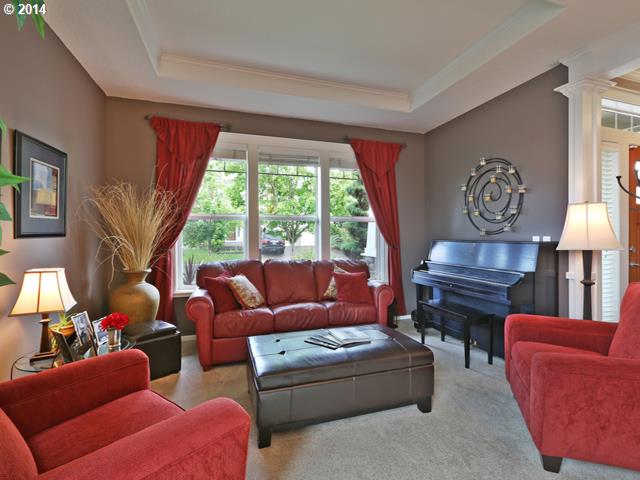 4920 Northwest 146th Place Portland, OR 97229 - Photo 2 of 16 a living room with furniture and a lamp