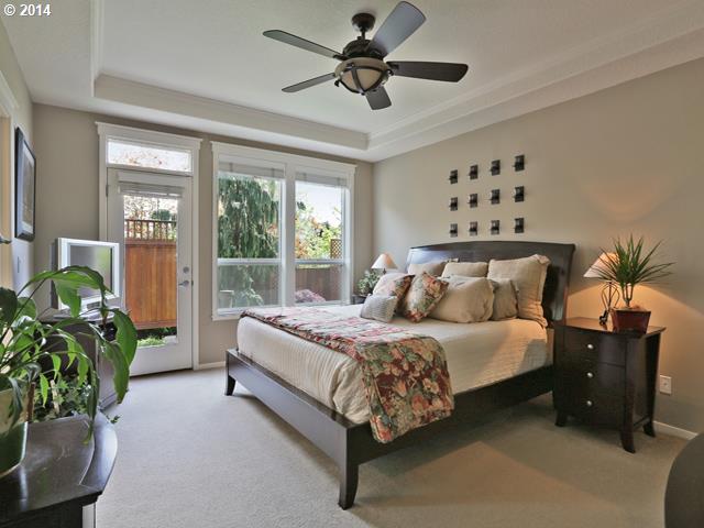 4920 Northwest 146th Place Portland, OR 97229 - Photo 9 of 16 a bedroom with a bed potted plant with the window