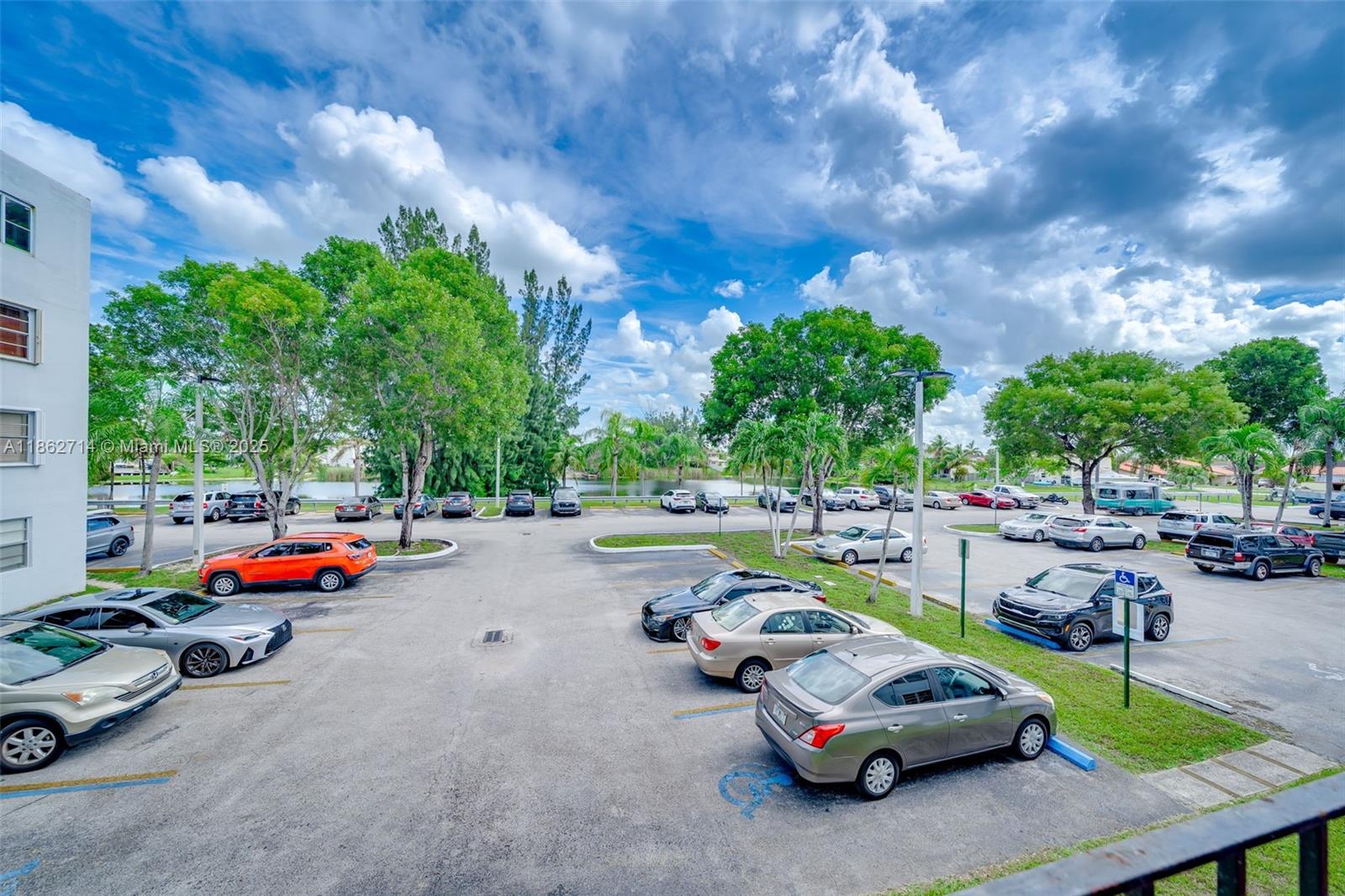 1221 Southwest 122nd Avenue, Unit 215 Miami, FL 33184 - Photo 25 of 57 a view of a backyard with swimming pool