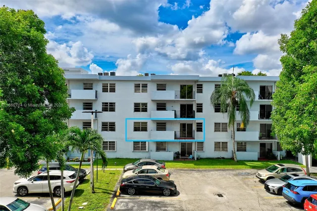 an aerial view of residential building with outdoor space