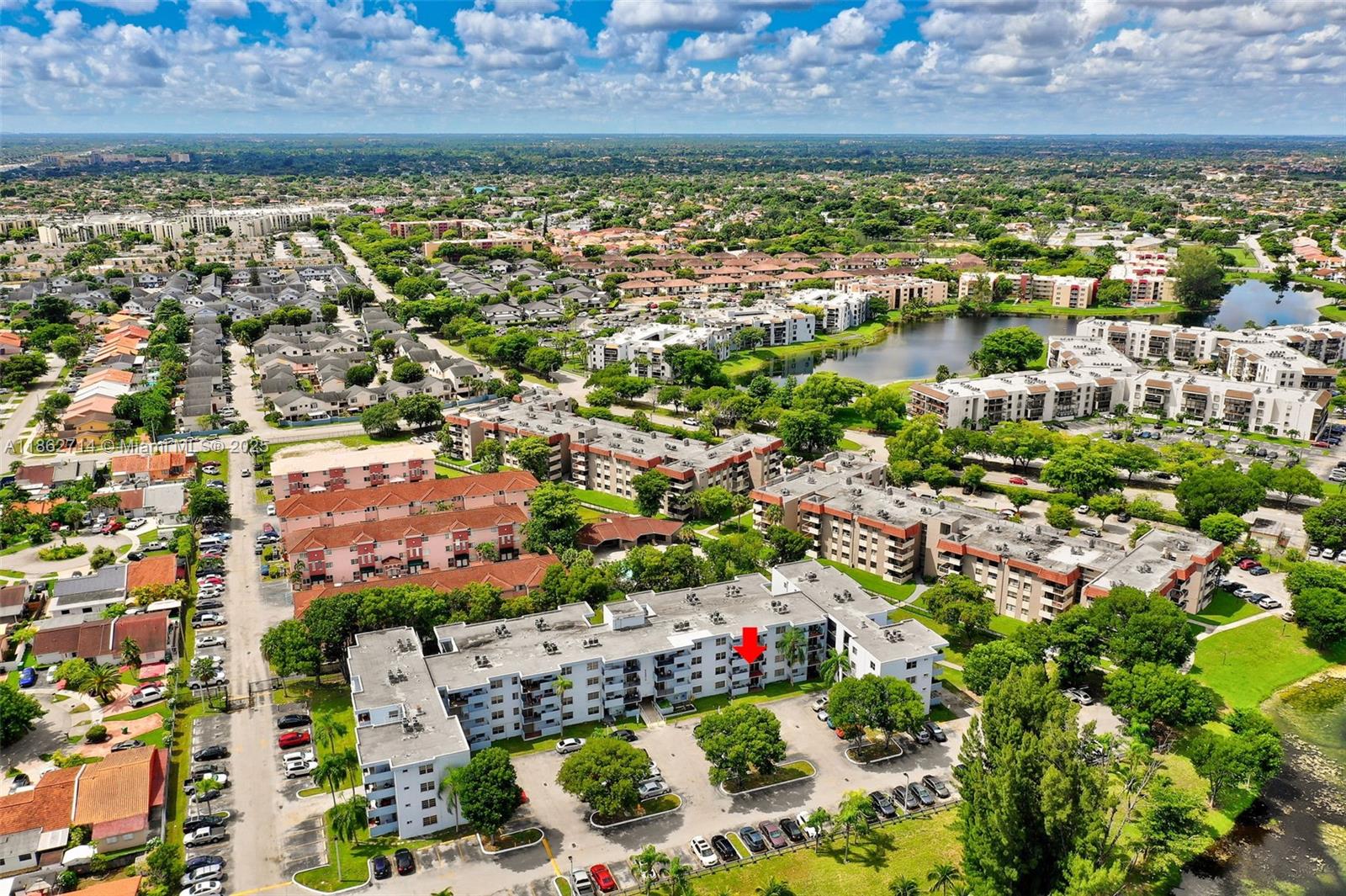 1221 Southwest 122nd Avenue, Unit 215 Miami, FL 33184 - Photo 55 of 57 a view of a city with lots of plants and water view