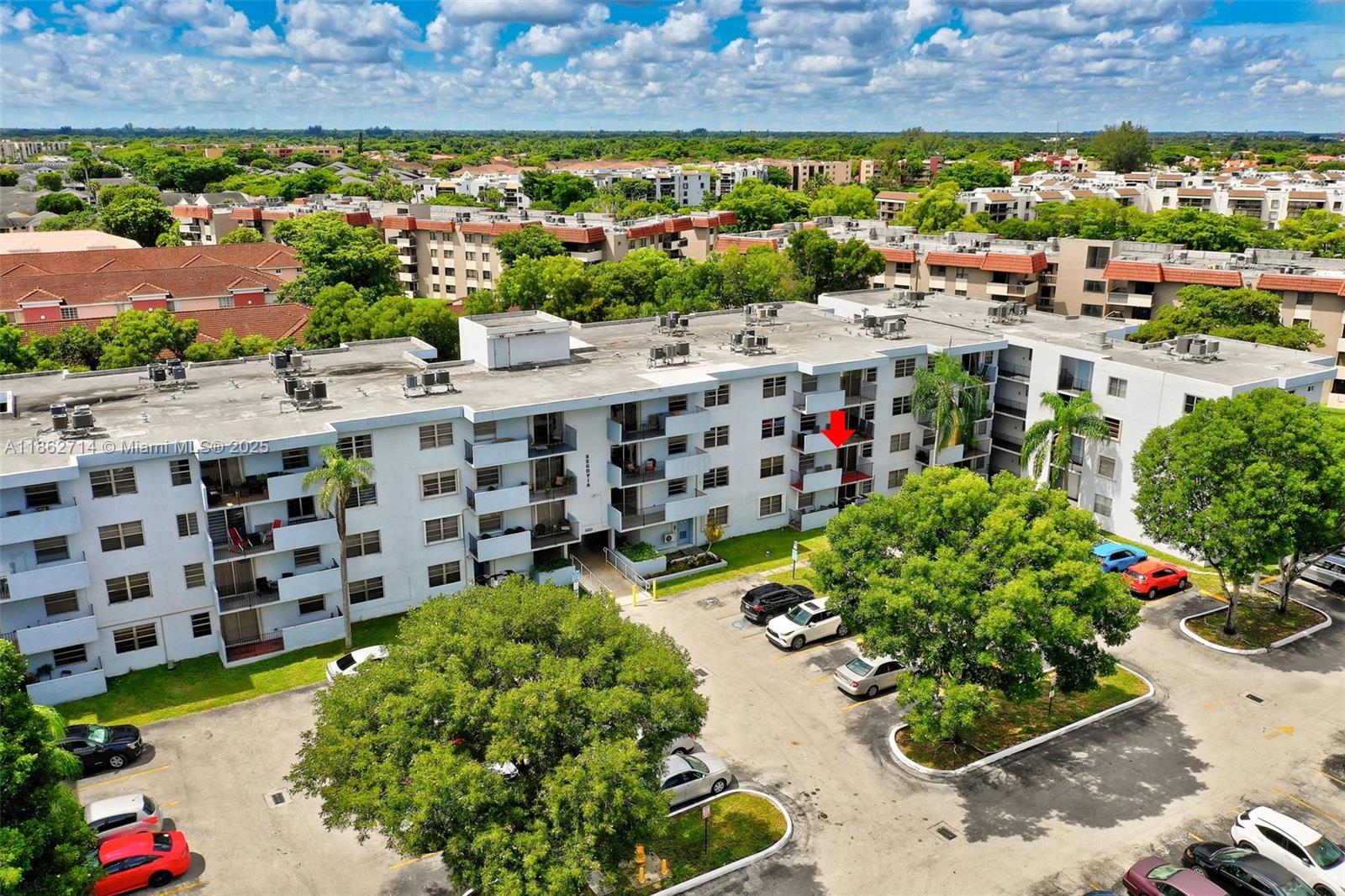 1221 Southwest 122nd Avenue, Unit 215 Miami, FL 33184 - Photo 57 of 57 a view of a city with tall buildings