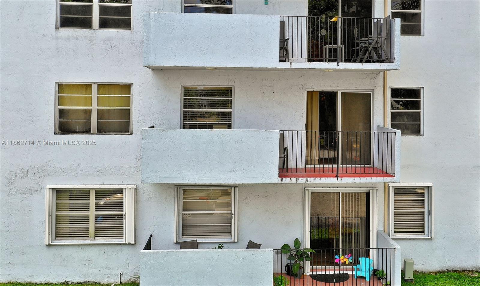 1221 Southwest 122nd Avenue, Unit 215 Miami, FL 33184 - Photo 10 of 57 front view of a building